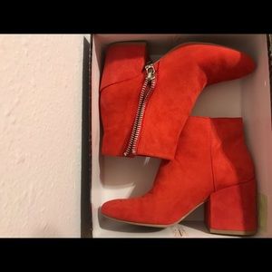 Red ankle boots